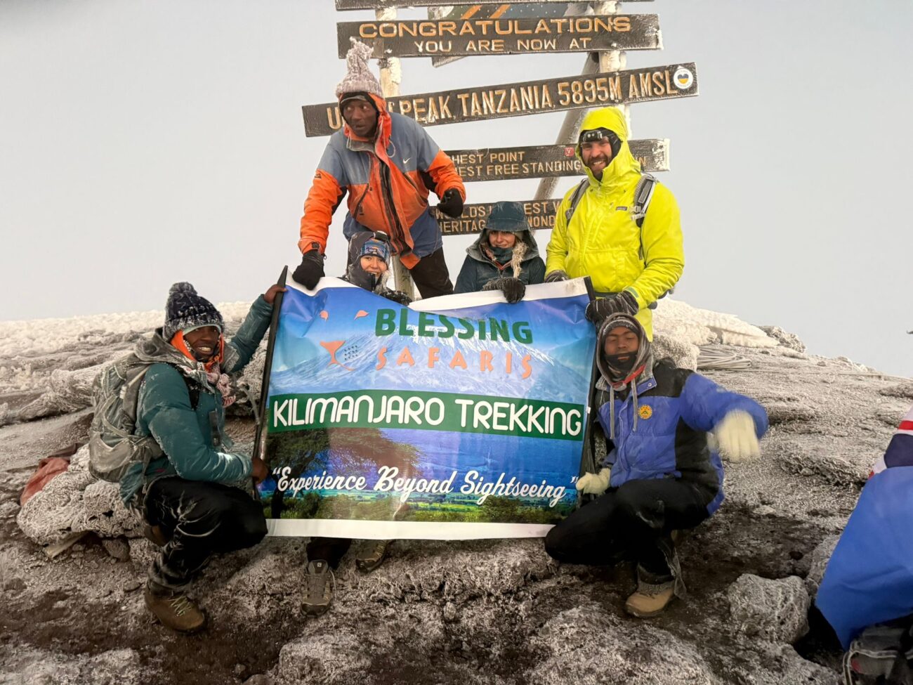 Kilimanjaro climbers on the summit as they climb through machame route